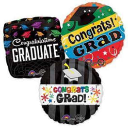Three graduation-themed foil balloons with congratulatory text