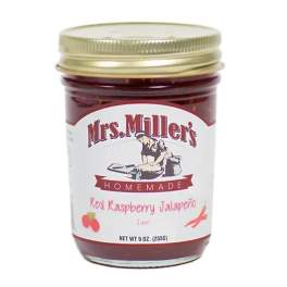 Jar of red raspberry jalapeño jam with a gold lid