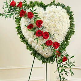 Broken heart with red rose break