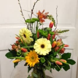 spring yellows in vase
