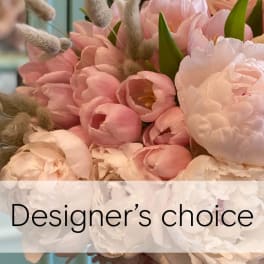 Pink and white tulips with fuzzy bunny tails in a bouquet