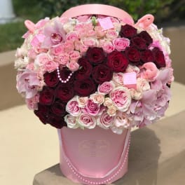 New life in our hands arrangement for baby girl
