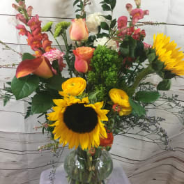 Bright and joyous by Seulberger's Florist