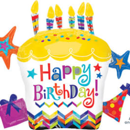 Birthday cake-shaped balloon with colorful candles and stars