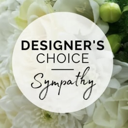 White sympathy floral arrangement with green accents