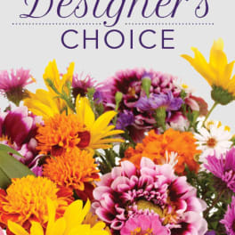 Colorful mixed bouquet with yellow, orange, pink, and purple flowers