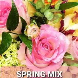 Colorful mixed bouquet with pink, orange, yellow, and white blooms