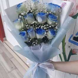 Bouquet with 12 roses in light blue