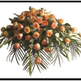 Orange roses arranged in a large cascading spray