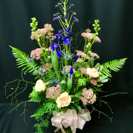 Small tall spring vase of blue and pink