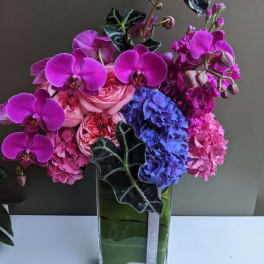 Raspberry Slim and Sexy Design with roses orchids and hydrangea