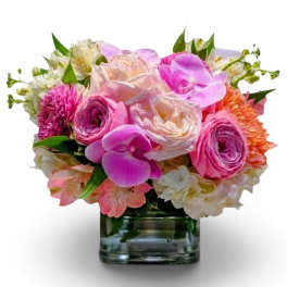 Pink and white mixed bouquet in a clear glass vase