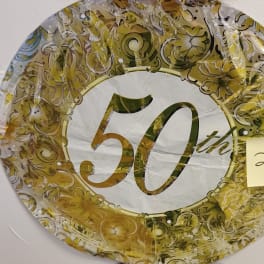 Round gold decorative balloon with the number 50