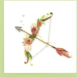 Quilled paper bow and floral design on a white card