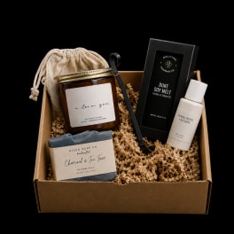 Gift box with a candle, soap, lotion, and soy melt in a drawstring pouch