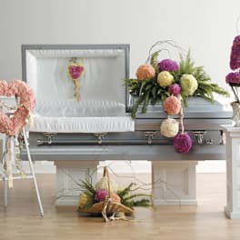 Carnations Spear Casket Spray, Heart, Topiary, Fireside Basket, and Heartlid Decoration