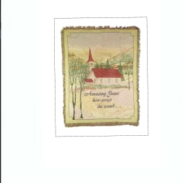 Framed wall hanging with a church scene and the text "Amazing Grace"
