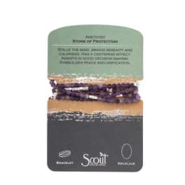 Purple beaded bracelet on a retail card labeled amethyst