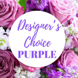 Purple and pink roses with small white and purple flowers