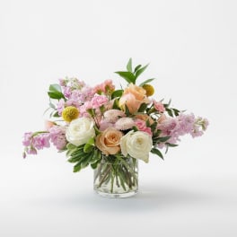 Mixed pastel bouquet in a clear glass vase