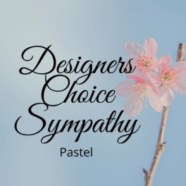 Pink blossoms on a branch beside the words "Designers Choice Sympathy Pastel"