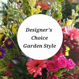 Mixed bouquet with pink roses, gerbera daisies, and purple asters