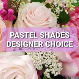 Pastel pink and white roses with small filler flowers