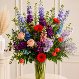 Colorful mixed bouquet in a clear glass vase