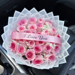 Pink rose bouquet with a pink "I Love You" ribbon