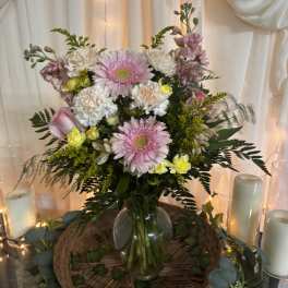 Pink and white mixed bouquet in a glass vase