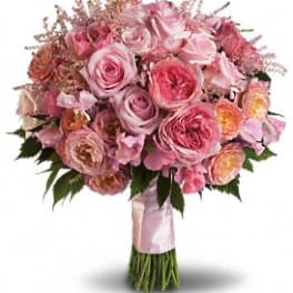 Pink rose bouquet tied with a satin ribbon