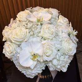 White rose and orchid bouquet with hydrangeas
