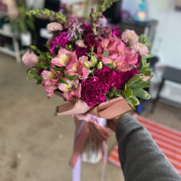Pink and magenta bouquet with ribbon wrap