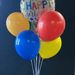 Birthday balloon bouquet with a foil "Happy Birthday" balloon and four latex balloons