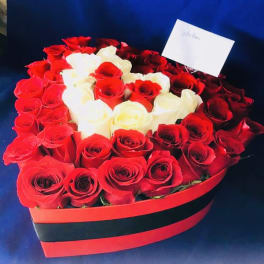 3 dozen roses on the red heart box