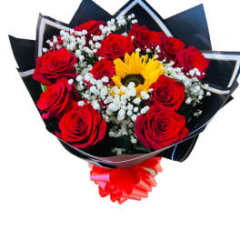 Bouquet of red roses with a yellow sunflower and white baby's breath