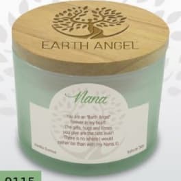 Mint green memorial candle in a glass jar with a wooden lid