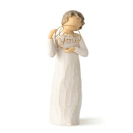 Angel figurine holding a gold "Love you" sign