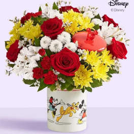 Bouquet of red, yellow, and white flowers in a Mickey Mouse vase