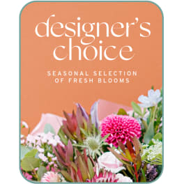 Designer’s choice seasonal blooms on an orange card