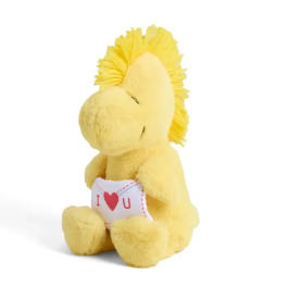 Yellow plush teddy bear holding an "I love you" pillow