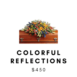 Colorful floral casket spray on a wooden coffin