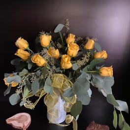 Stylish Yellow Dozen Roses in eucalyptus hug