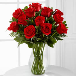The FTD Blooming Masterpiece Rose Bouquet (one dozen red roses, OR MIXED COLORS