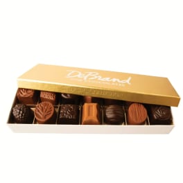 Box of assorted chocolates in a gold gift box