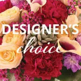 Mixed bouquet of roses, calla lilies, and purple flowers