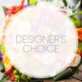 Mixed bouquet of colorful flowers with a designer's choice label