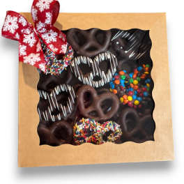 Box of chocolate-covered pretzels with a red ribbon bow