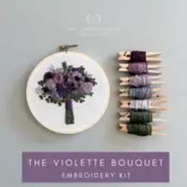 Embroidery kit with a purple bouquet design and thread colors
