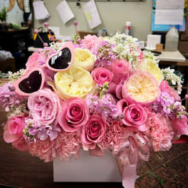 Pink and yellow rose bouquet with heart-shaped sunglasses